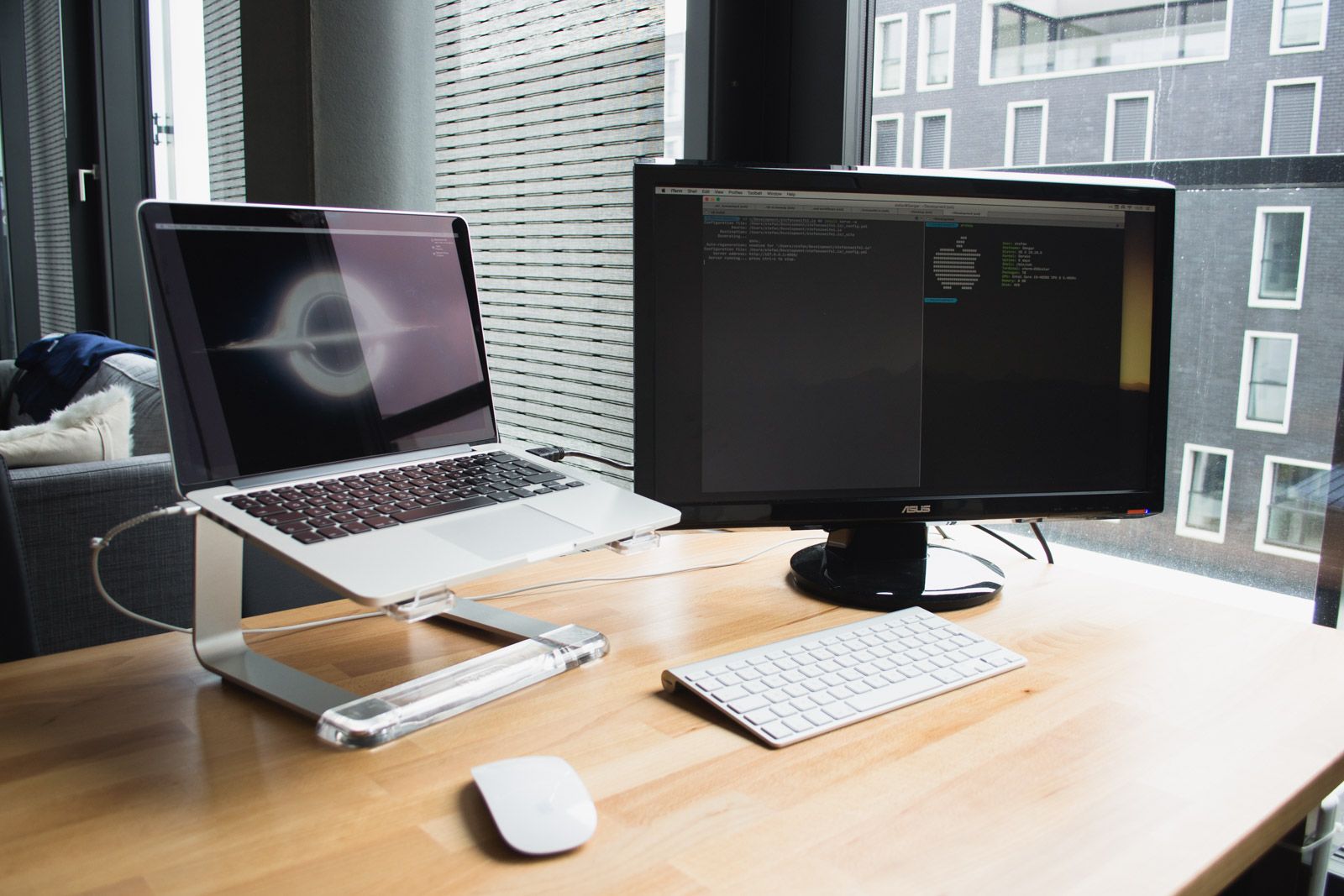 Photo of my Macbook on my desk at home.